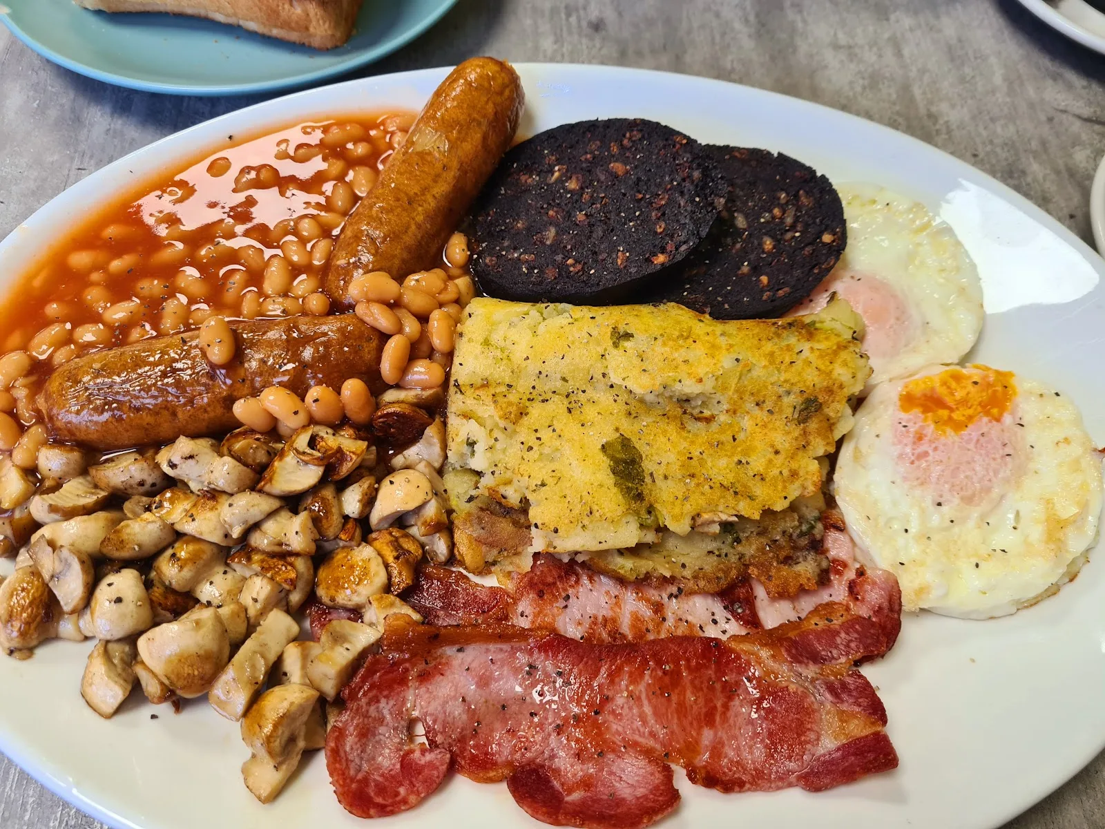 The Cowplain Mega Breakfast with sausages, bacon, black pudding, bubble and squeak, mushrooms, beans and fried eggs